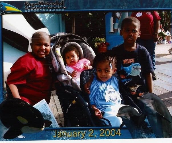 Kiona with her siblings on a family trip